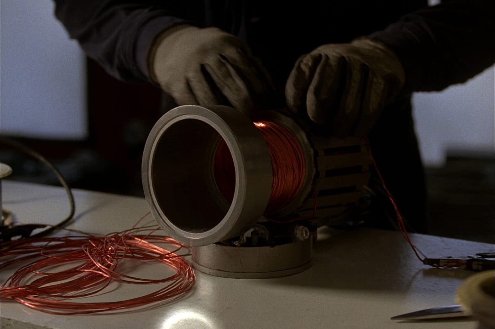 Copper windings being placed in a motor stator